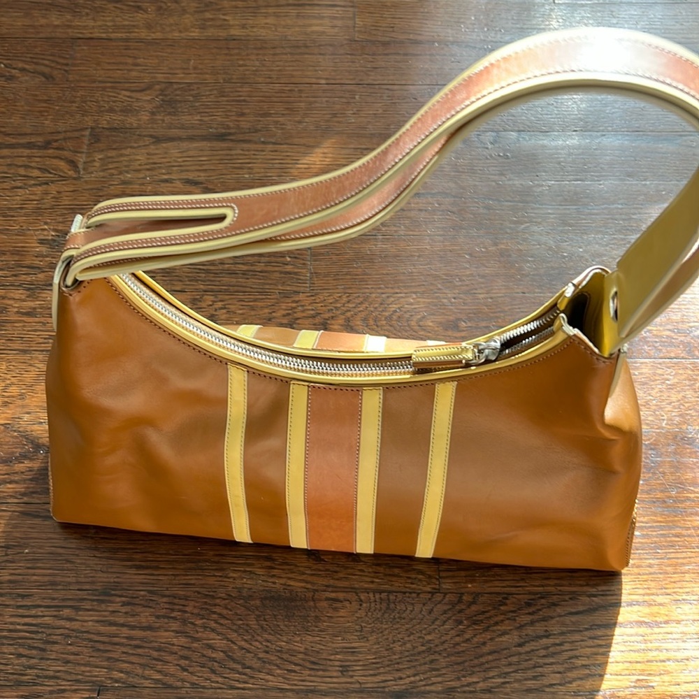 Authentic Tod’s caramel
Bag